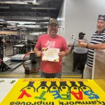 John holding Safety Award - One Year Accident Free