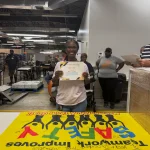 Tracy holding Safety Award - One Year Accident Free